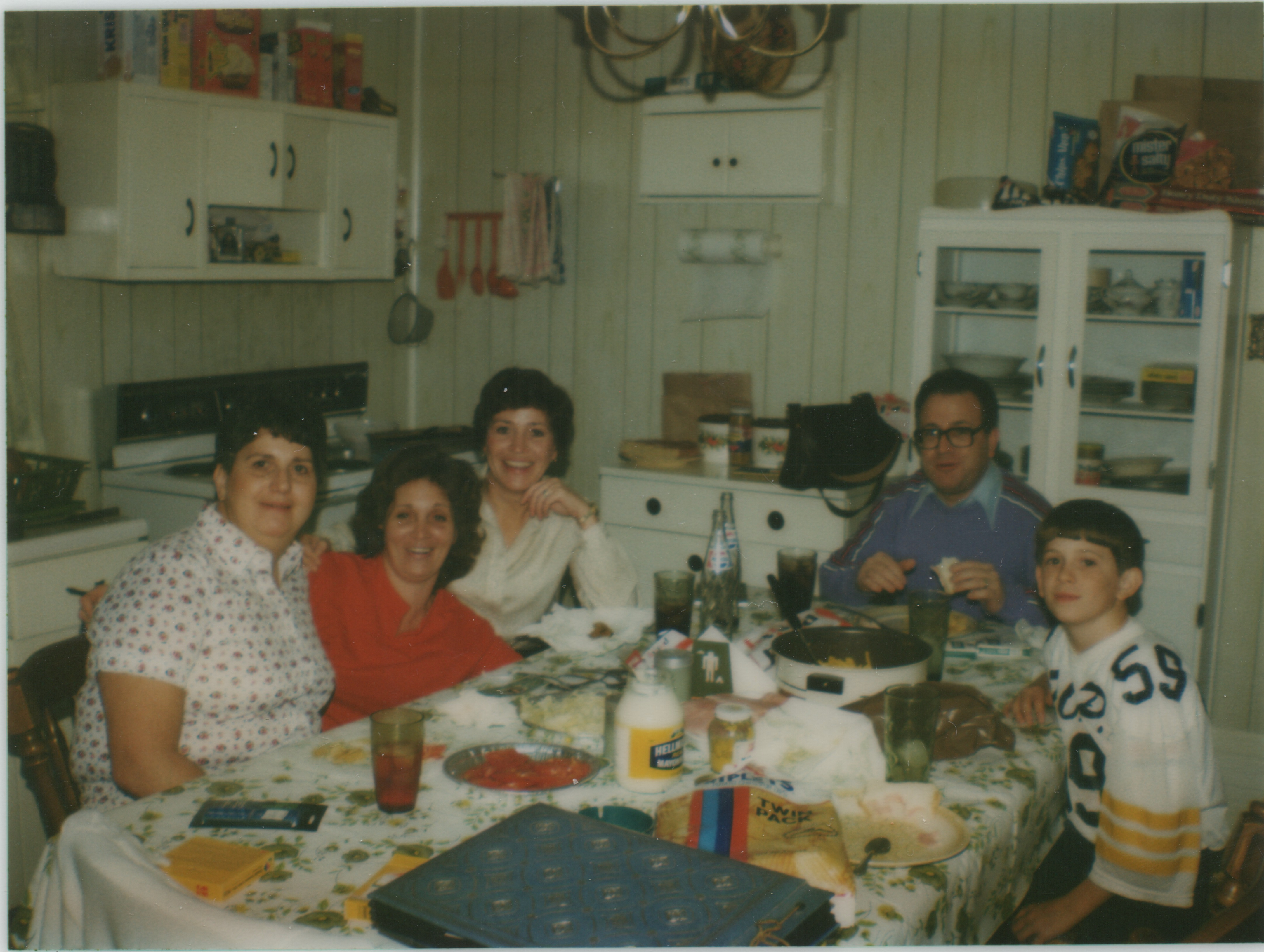 Siblings around the kitchen table
